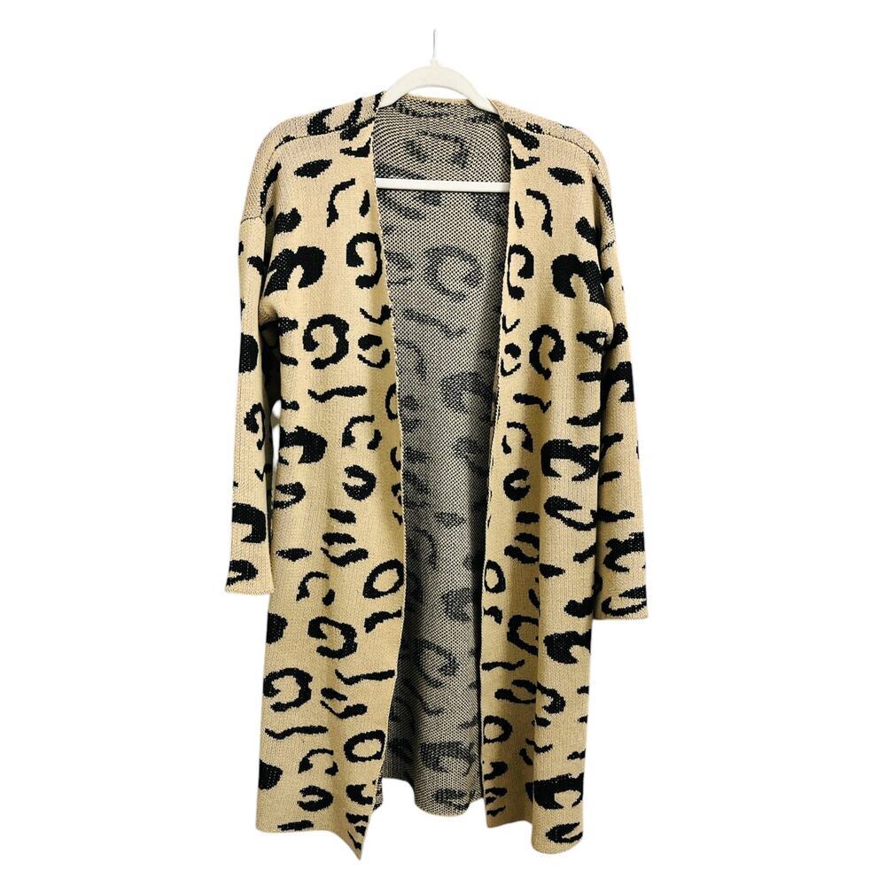 Woman's Long animal print cardigan sweater. Size M. Wrap. No button or zipper.